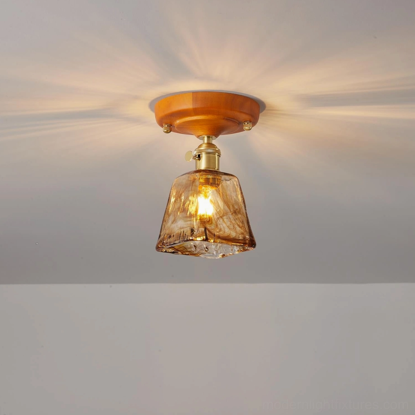 Vintage glass ceiling light fixture bathroom installation warm ambient setting