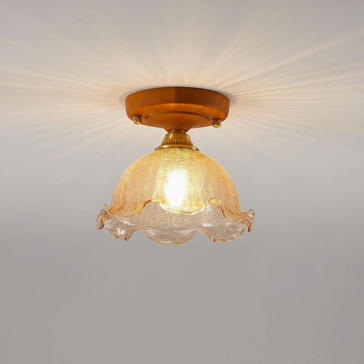 Vintage hand-blown glass ceiling light fixture installed in mid-century modern interior setting