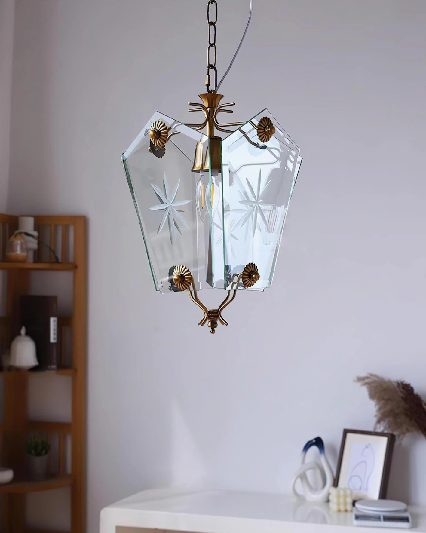 Vintage star-etched glass pendant lamp detail shot brass metalwork geometric design
