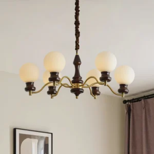 6-head matte white glass globe pendant chandelier in modern living room interior with brass hardware