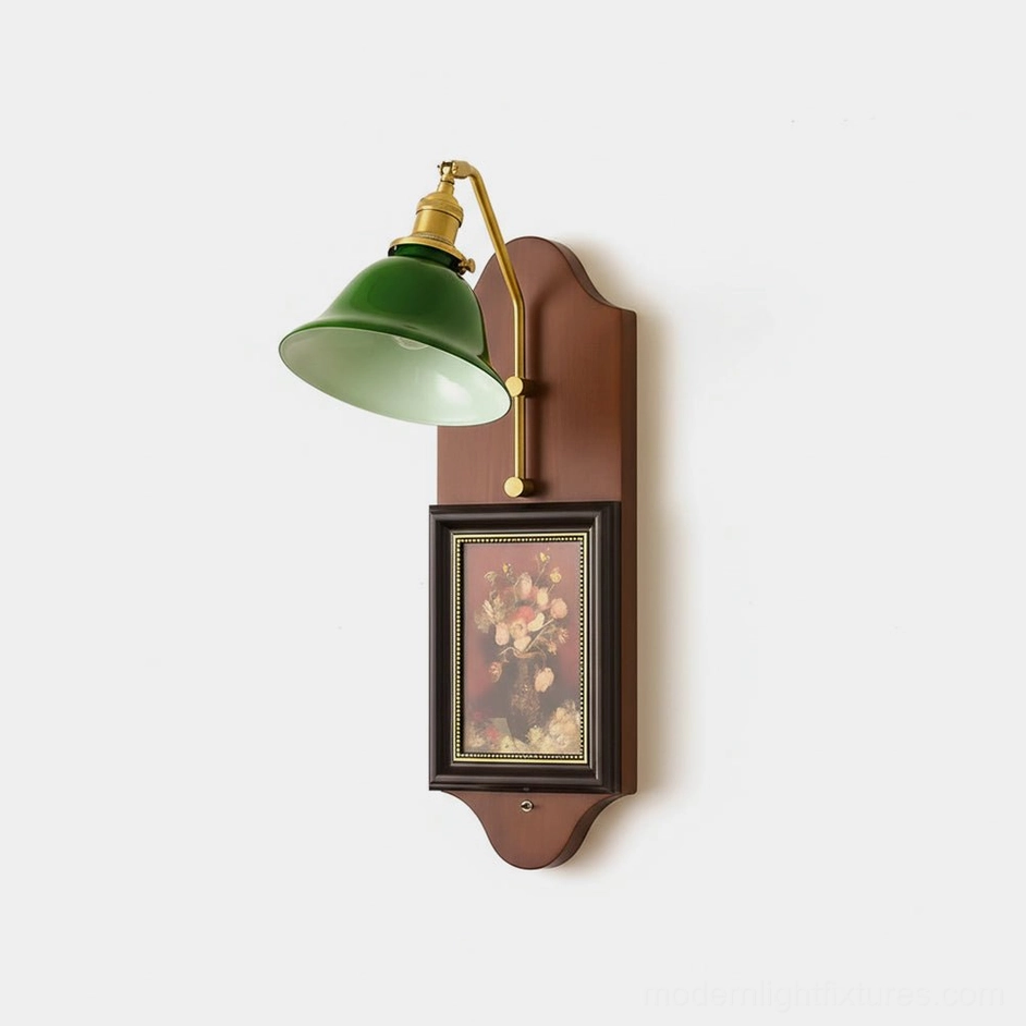 Vintage green glass wall sconce with brass arm and walnut wood backplate, front angled view on plain wall