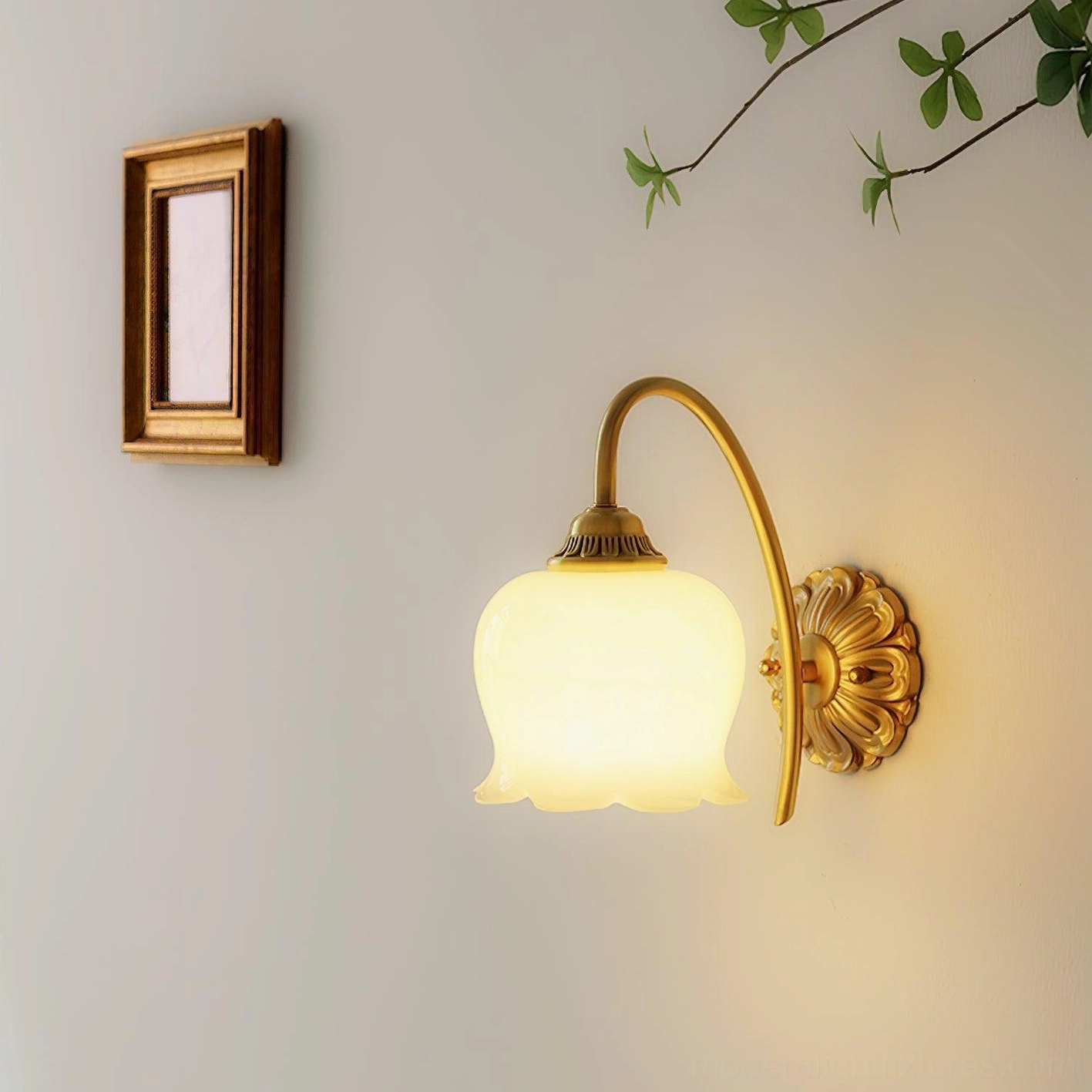 Vintage Lily of the Valley Wall Sconce Front Three-Quarter View with Ornate Brass Base and Warm Ambient Glow