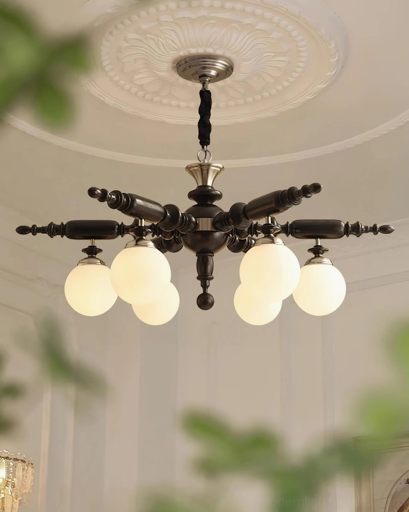 Dark-stained Olina chandelier overhead view in classic French interior with ceiling medallion