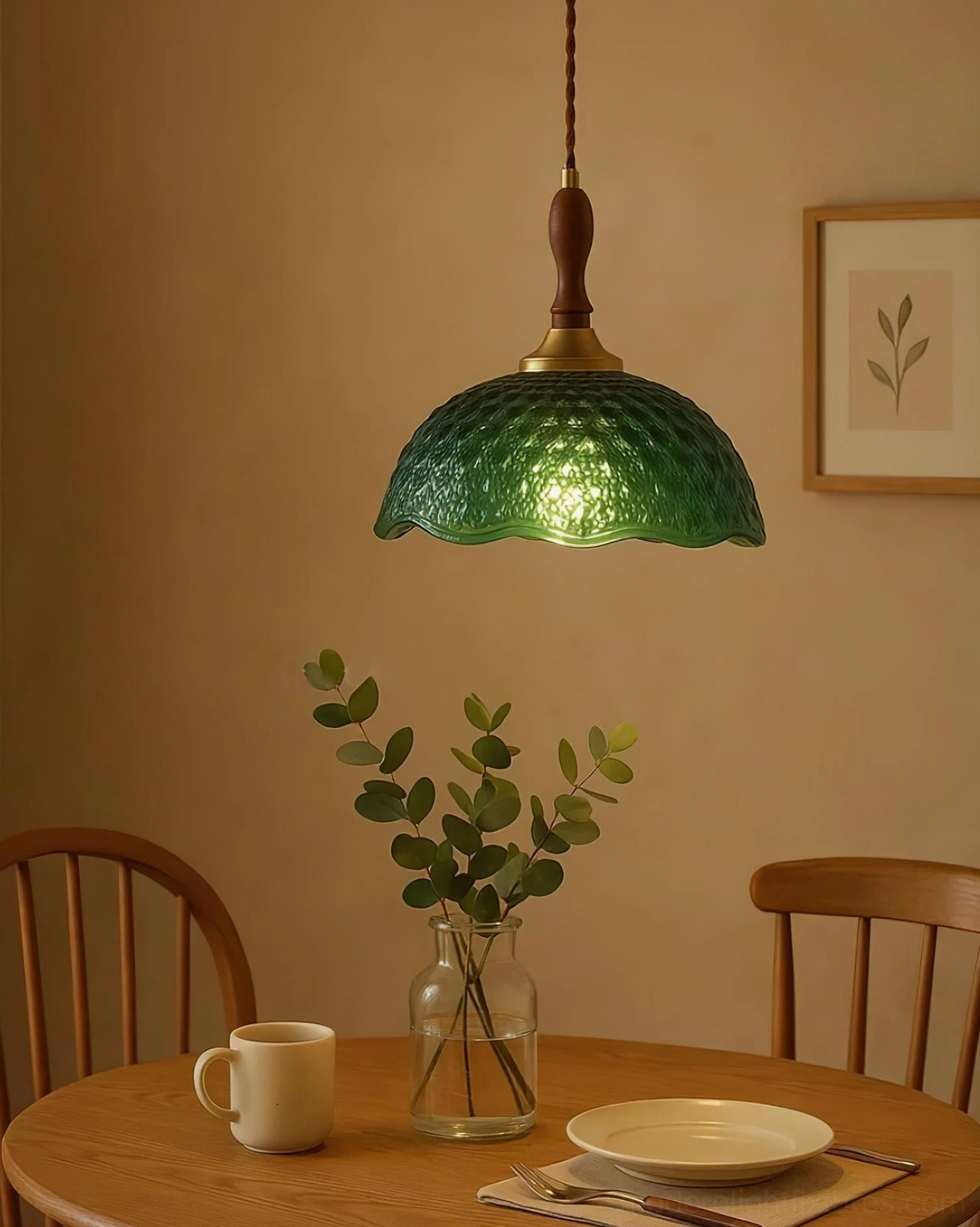 Grevia vintage pendant lamp installed over dining table in warm wooden room with ambient green glass lighting