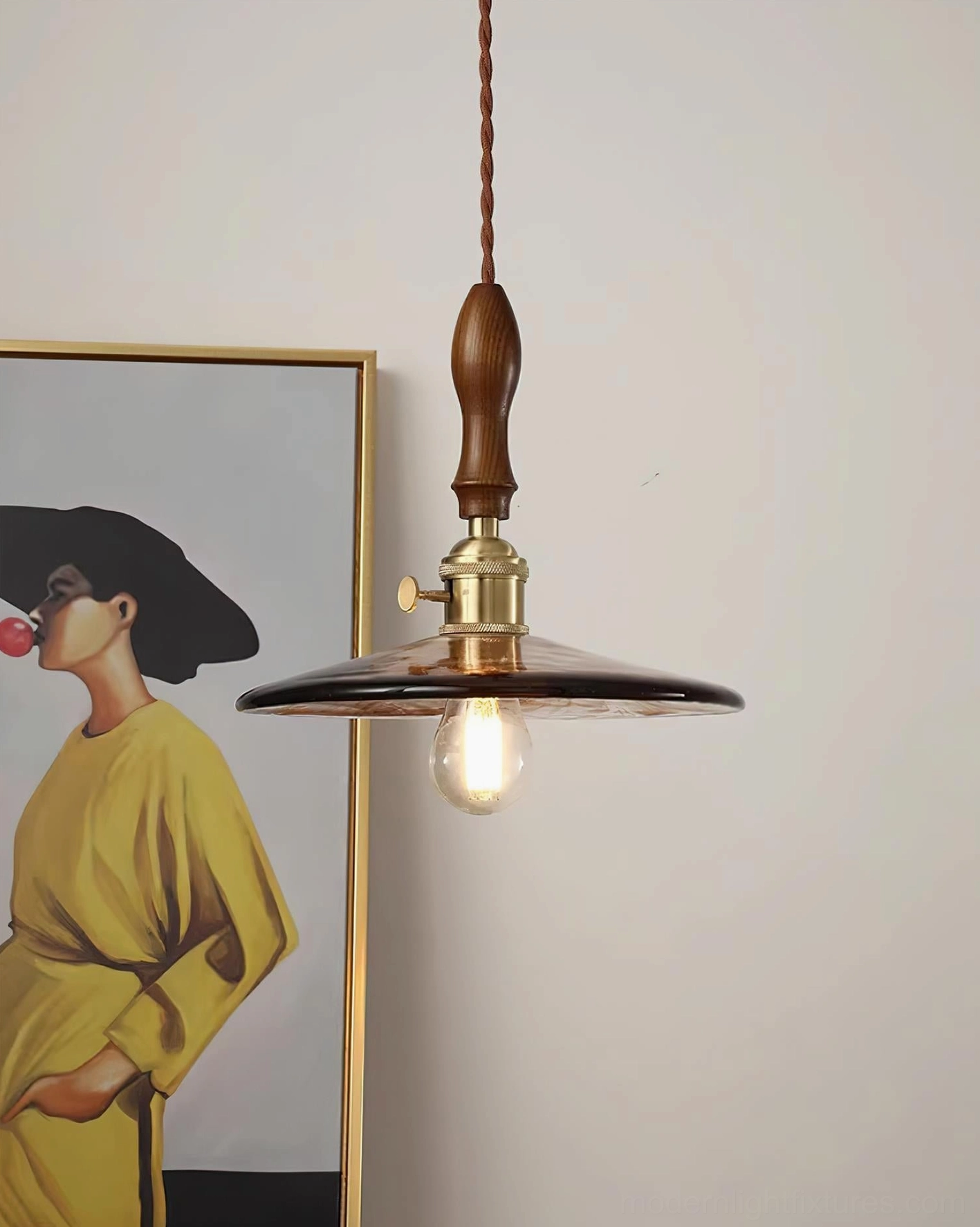 Hanging vintage pendant light with twisted brown fabric cord and retro styling