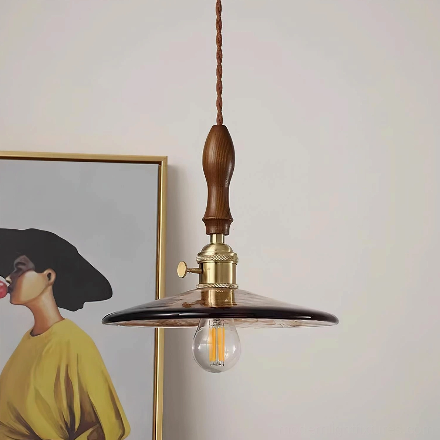 Vintage pendant light with filament Edison bulb creating warm retro glow - interior setting