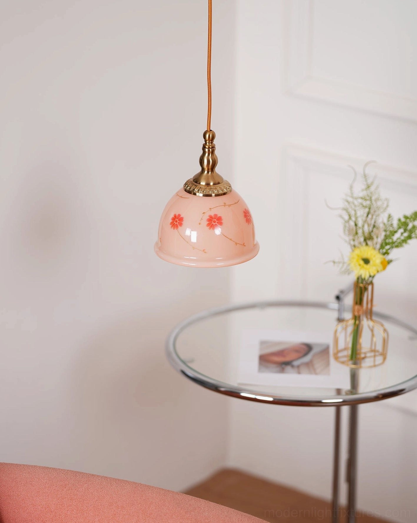 Vintage pink ceramic floral pendant light with brass gold hardware bell-shaped design from front