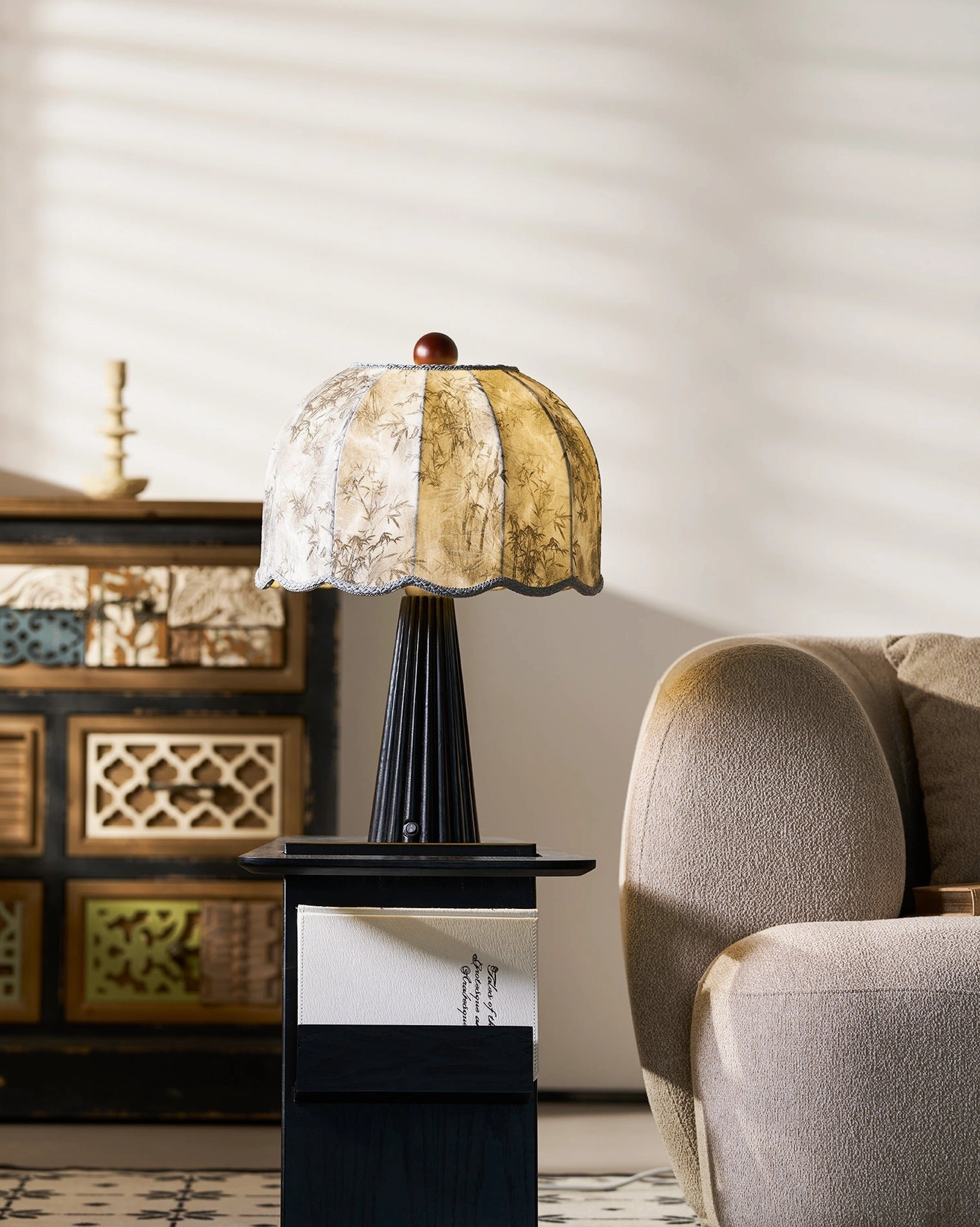 Vintage style pleated table lamp beside upholstered furniture - transitional home decor