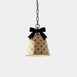 Vintage polka dot pendant light with black bow detail, beige fabric shade with black polka dots, metal suspension chain, Parisian farmhouse style