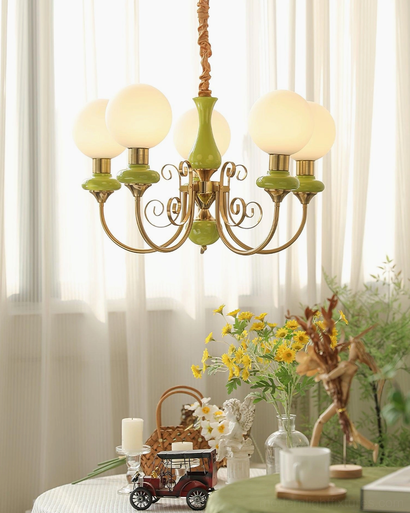 Vintage retro glass chandelier with illuminated frosted shades and swirling arms