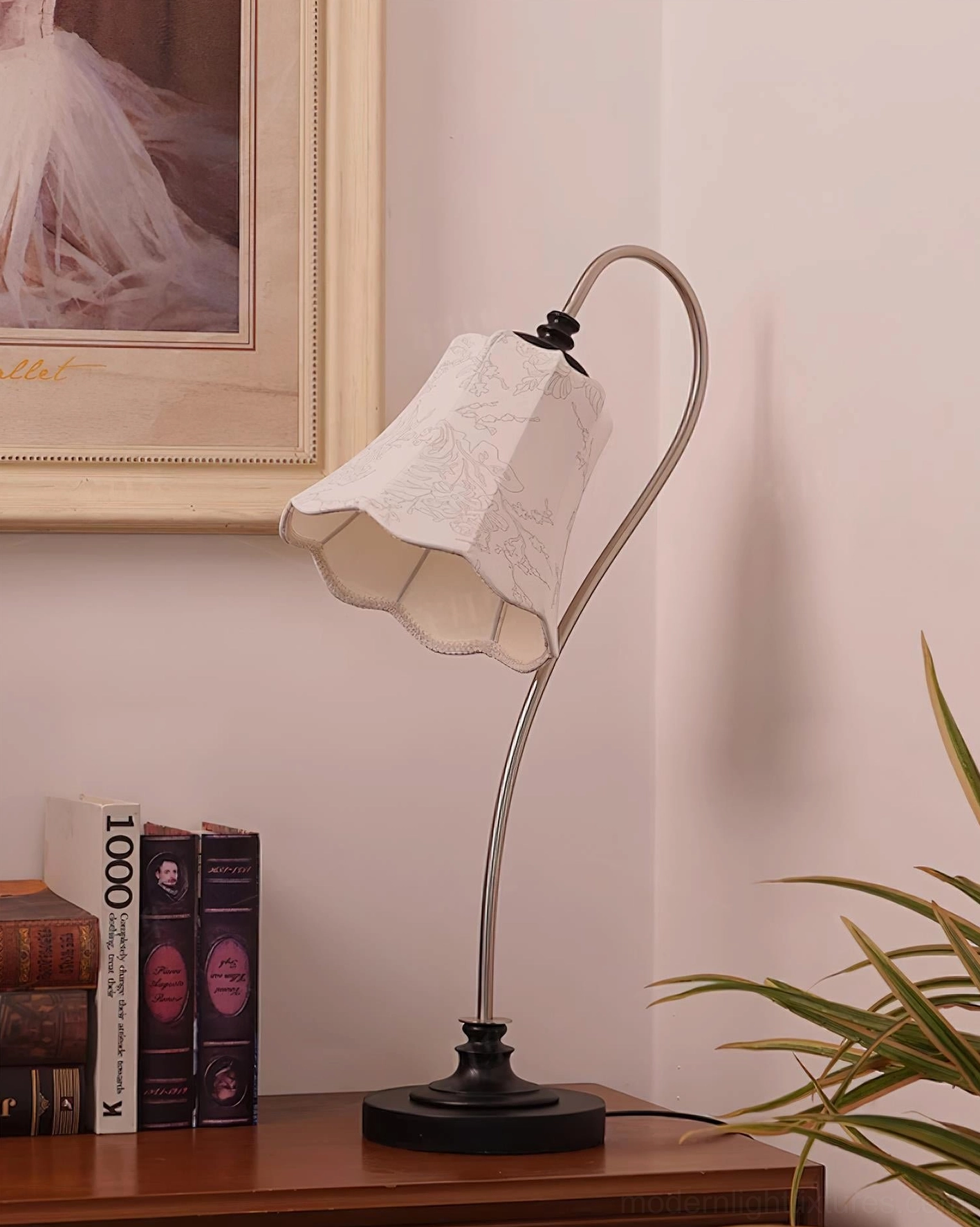 Vintage table lamp with fabric lace shade and dark wooden base casting decorative shadow patterns