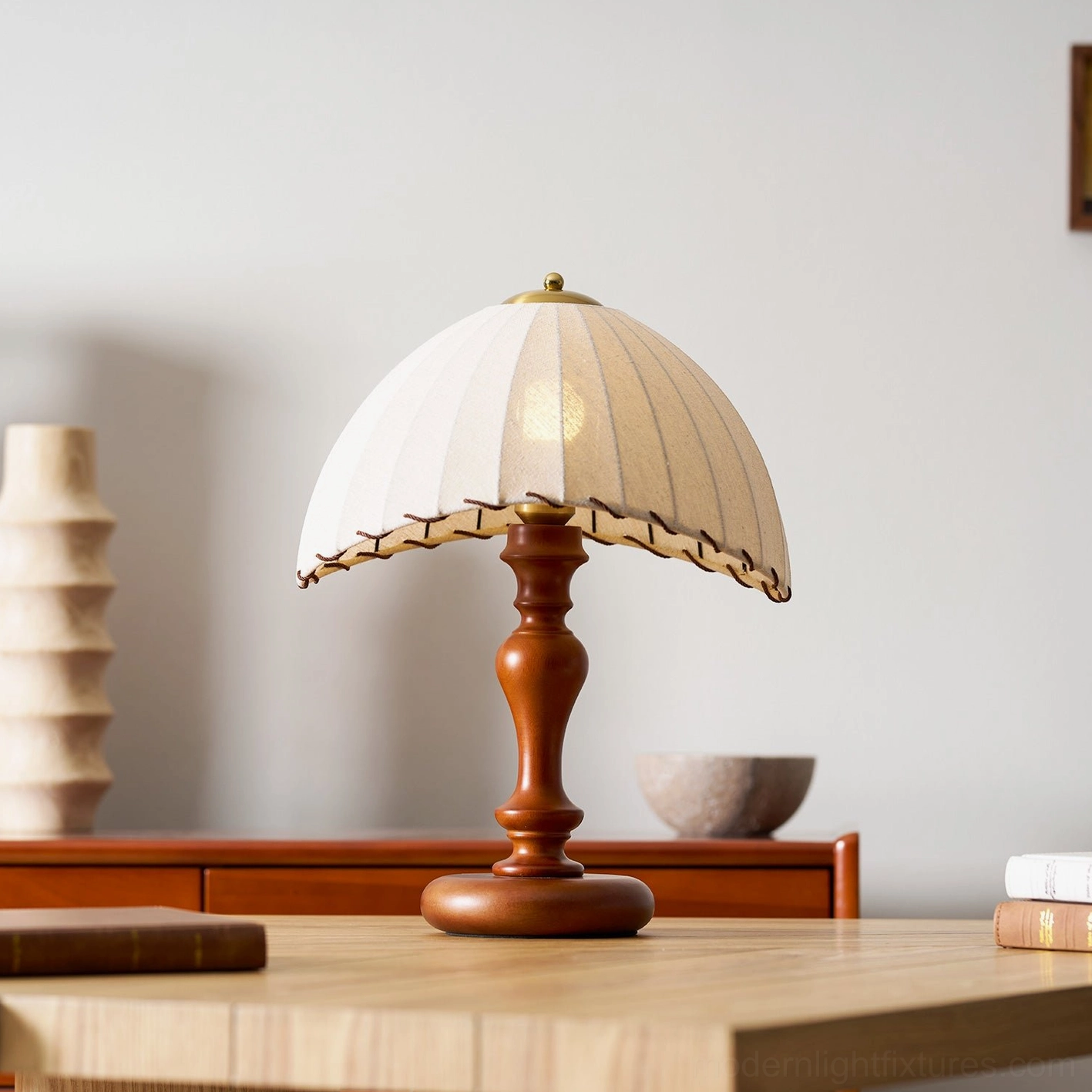 Vintage farmhouse table lamp with pleated fabric shade on minimalist wooden table display