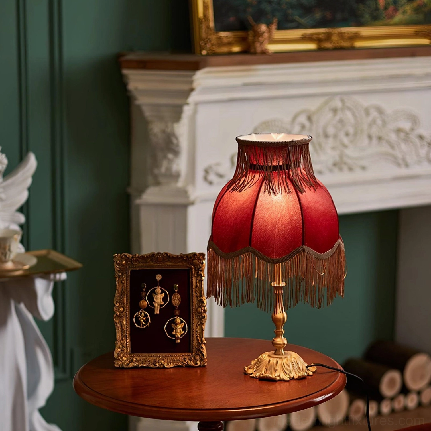Vintage tassel table lamp with red velvet shade positioned by fireplace in traditional interior setting