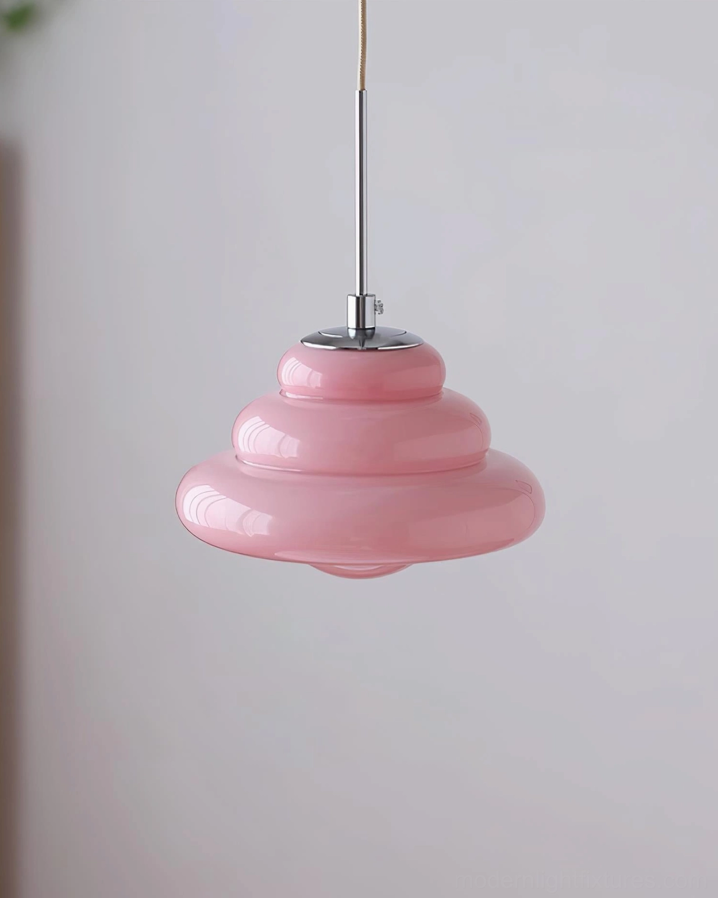 Vintage style tiered pendant light showing light reflection and ambient glow effects