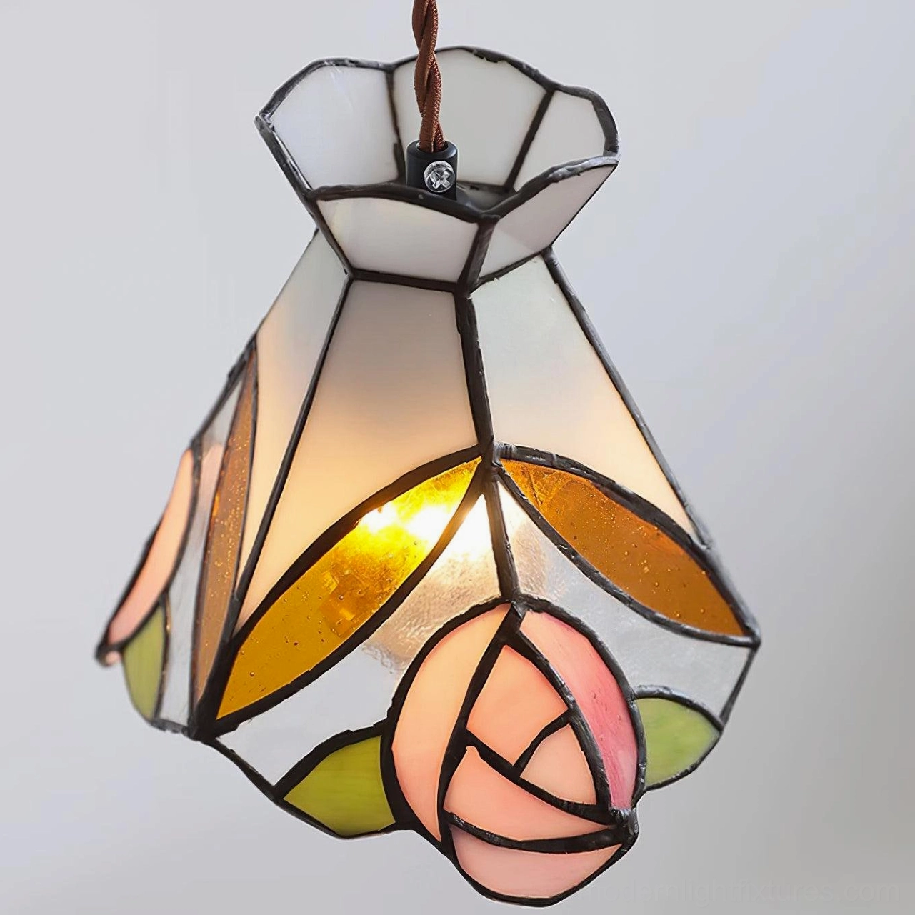 Vintage Tiffany rose stained glass pendant with delicate floral details and brass mounting hardware
