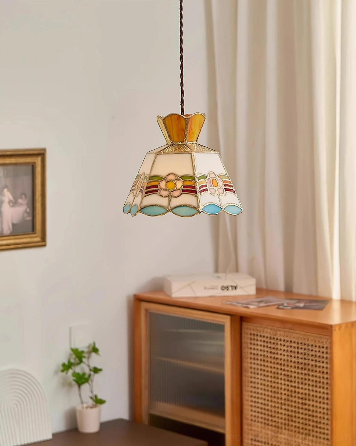 Vintage Tiffany stained glass pendant showcasing yellow, pink, and aqua blue glass color coordination
