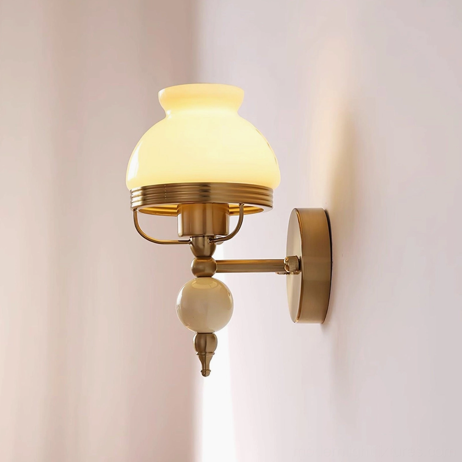 Vintage floral wall sconce installation view showing proper mounting and brass fixture