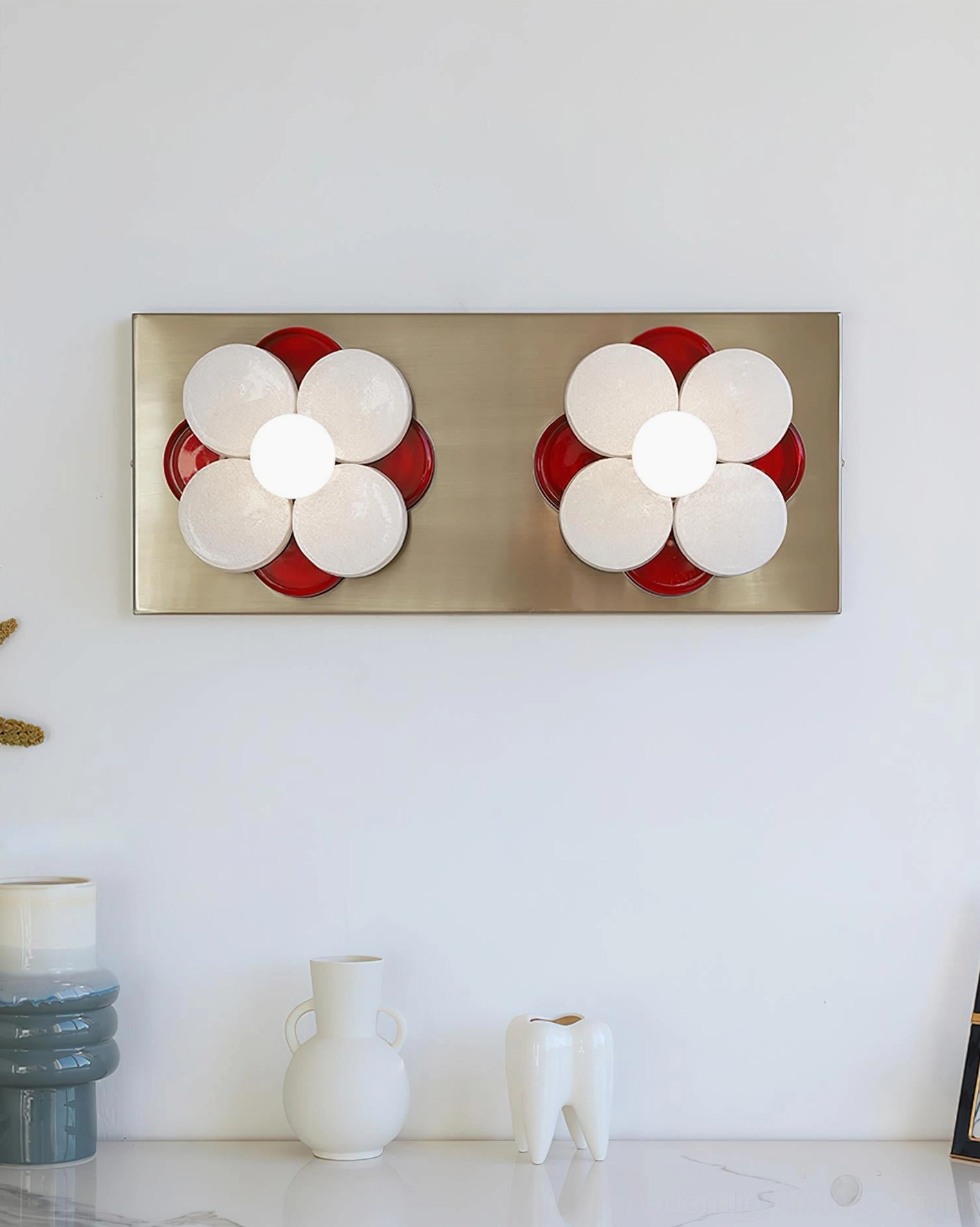 Violetta flower wall lamp detail shot showing layered frosted glass petals with color accent and chrome metal mounting