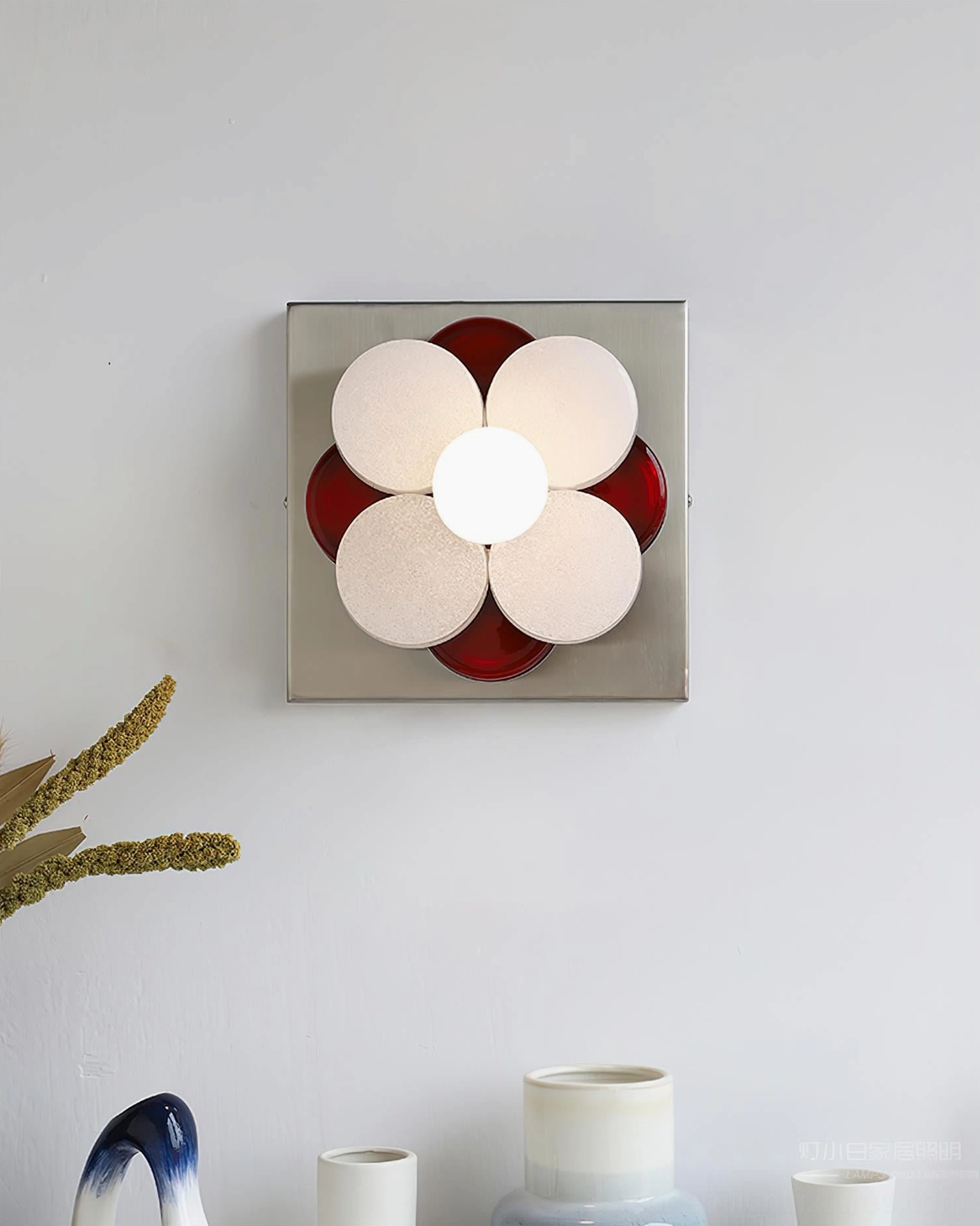 Violetta mid-century modern wall sconce with blue frosted glass petals and chrome base, sculptural flower-shaped lighting fixture