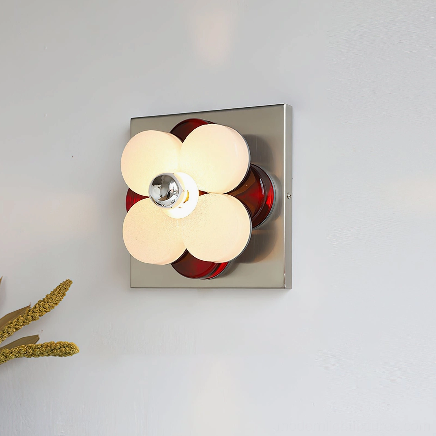 Violetta wall sconce room setting showing fixture integrated into contemporary bedroom ambiance with warm accent lighting
