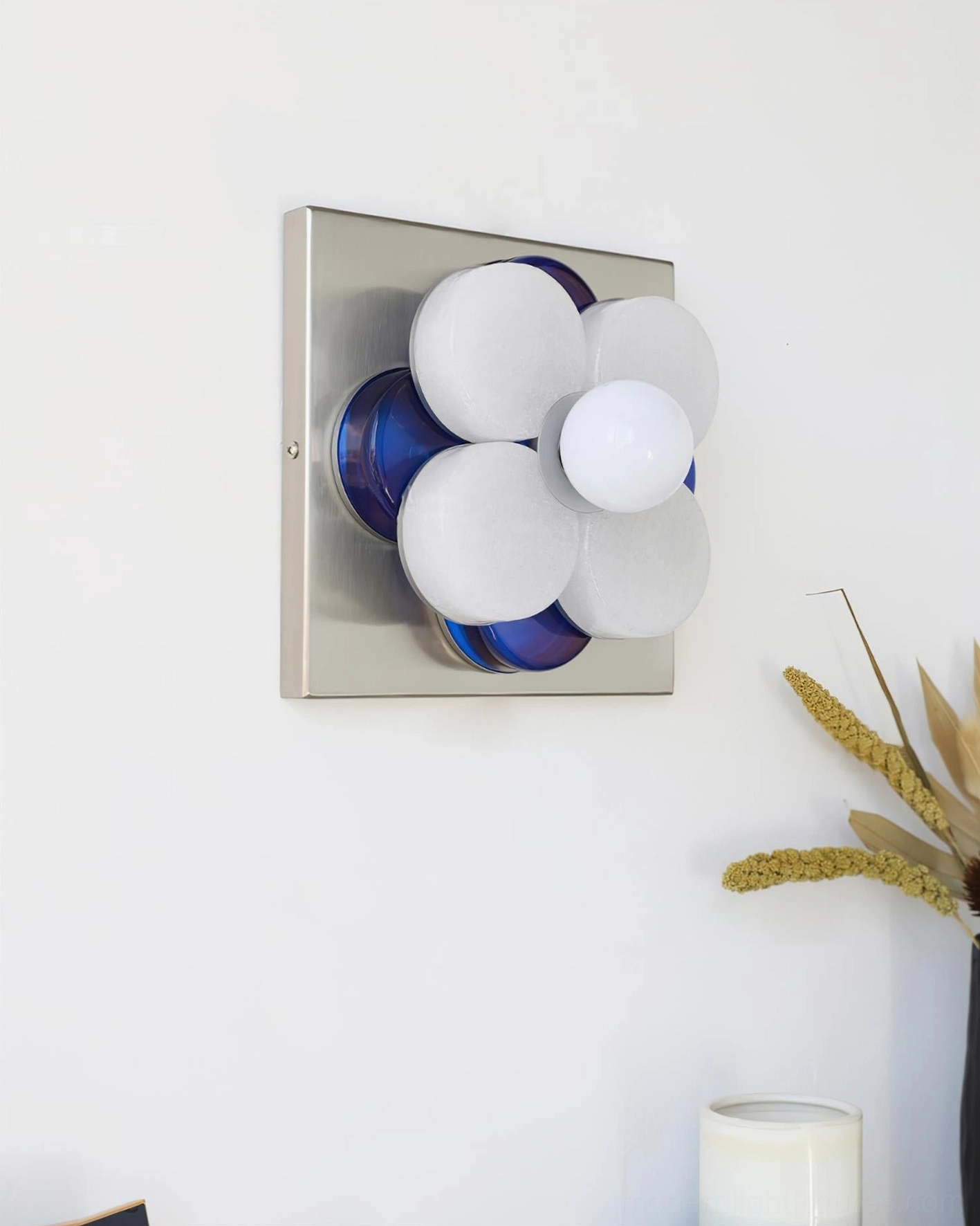 Violetta wall sconce oblique side angle showing silver chrome mount with white frosted shades and red-blue retro accents