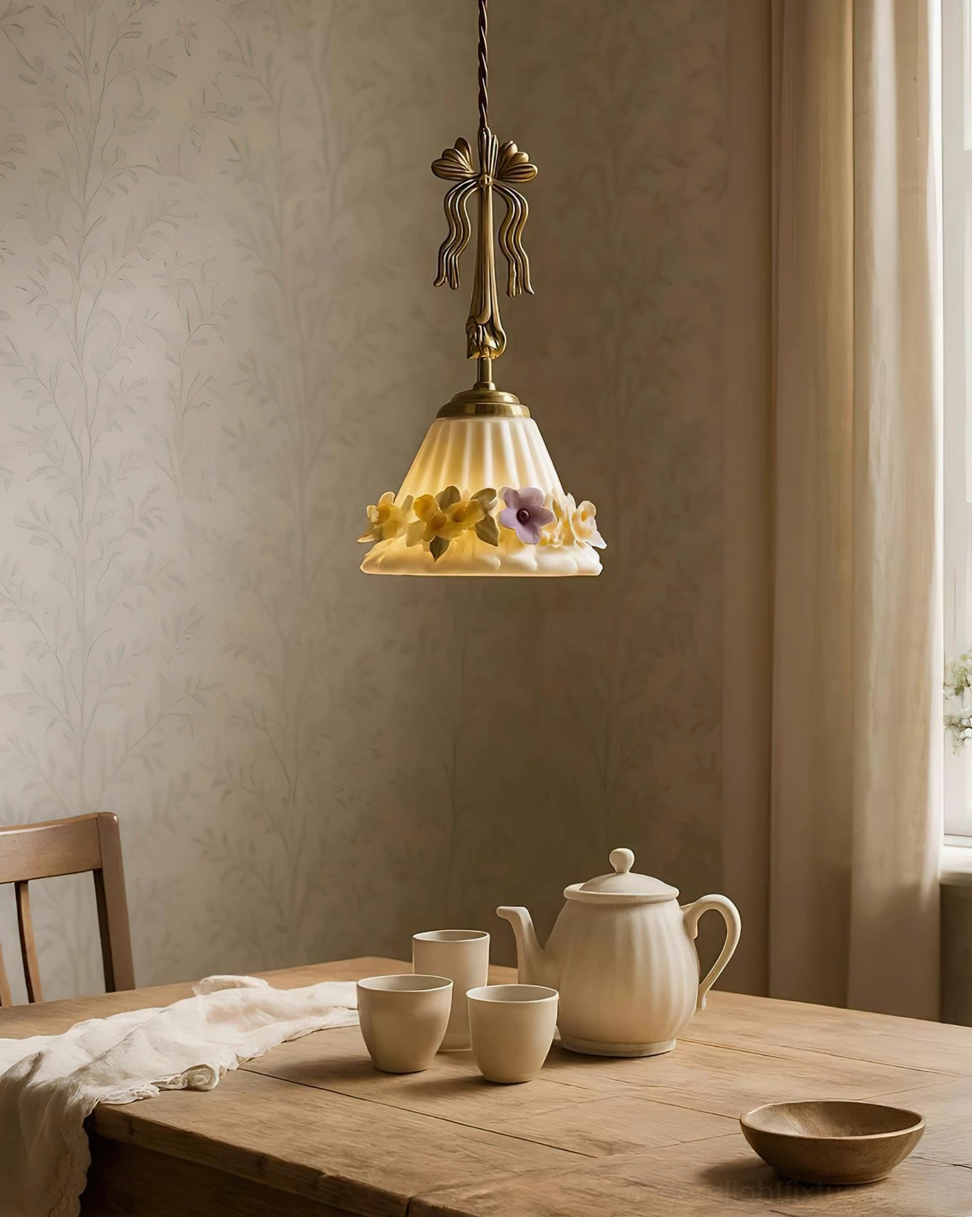 Multiple Vionna pendant lamps creating French country aesthetic with coordinated ceramic shades and brass accents