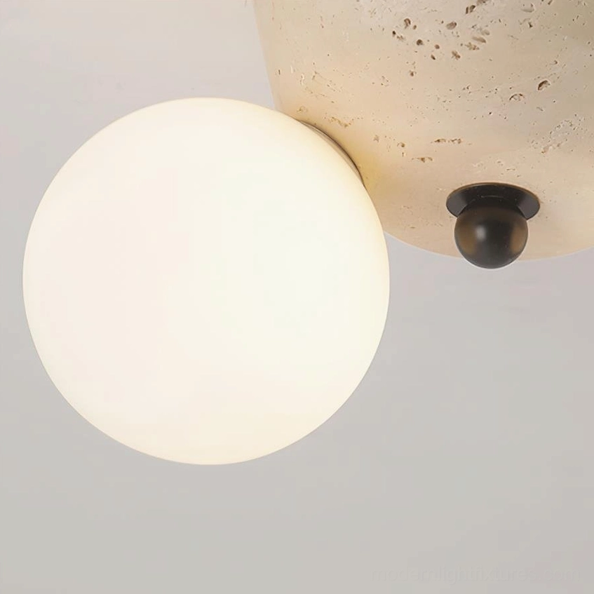 Modern travertine ceiling light showing natural stone surface texture and character