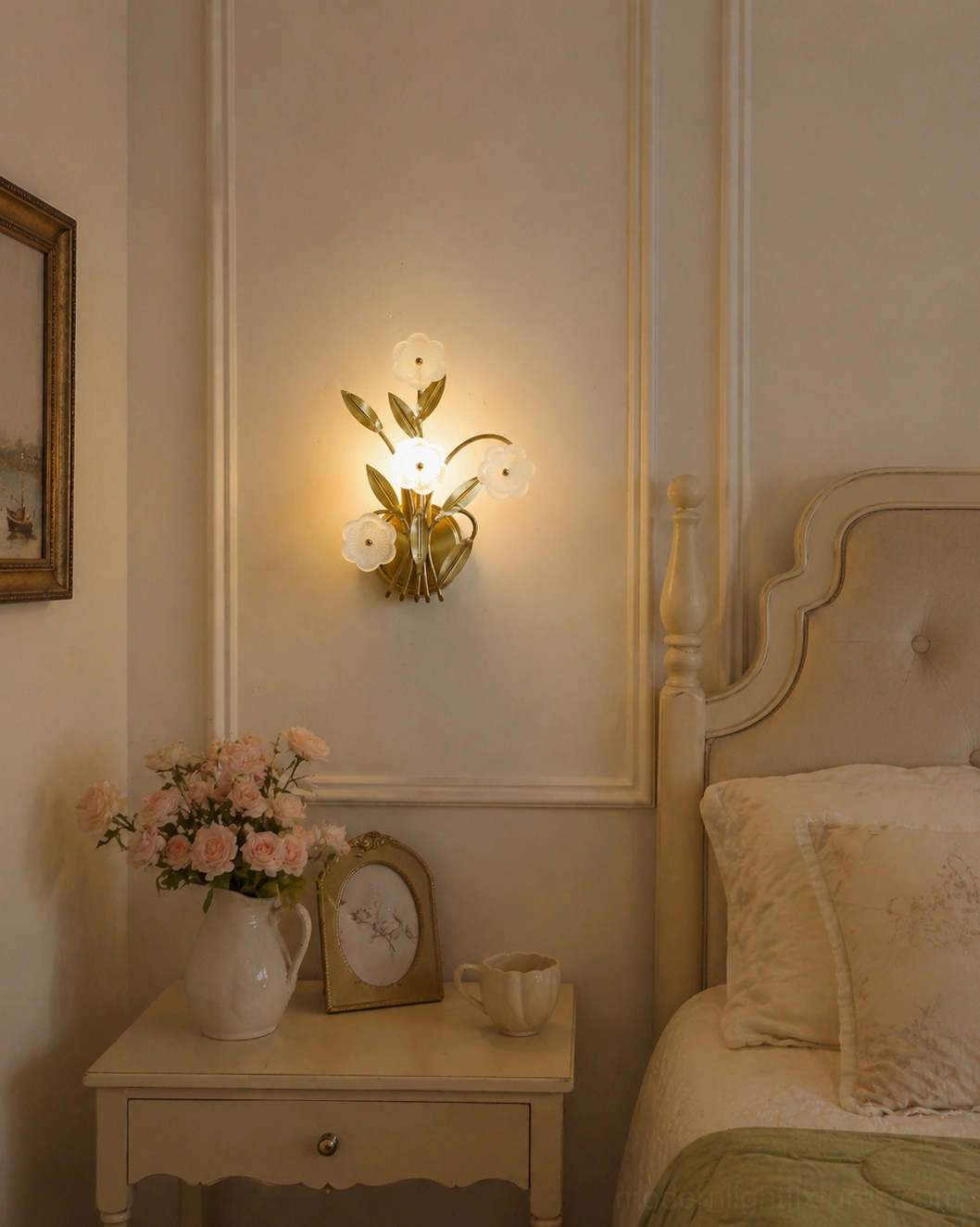 Virella wall sconce mounted in French classic bedroom above tufted headboard with soft ambient lighting