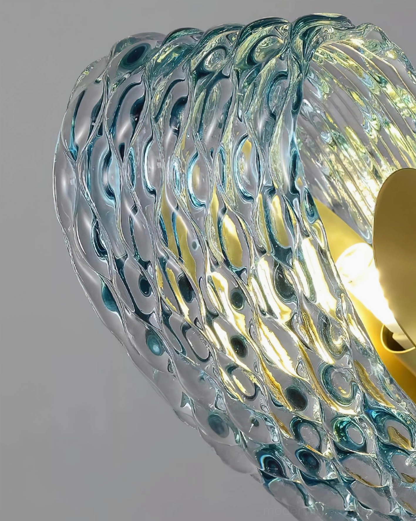 Virello modern linear glass chandelier staged in sophisticated interior setting with premium finishes and design elements
