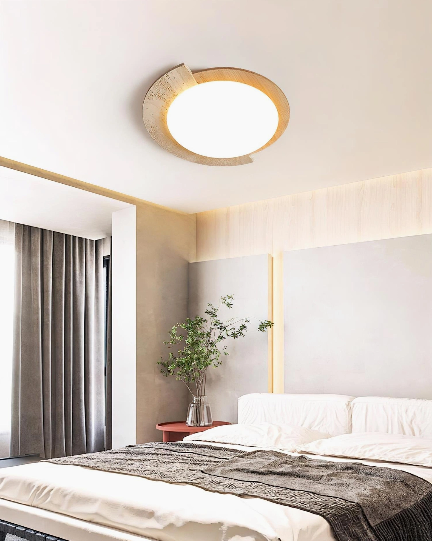 Minimalist design ceiling light showing organic travertine texture and warm metal frame