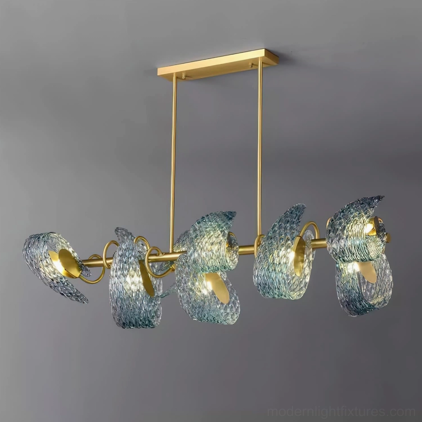 Virello modern linear chandelier contemporary design detail view with textured blue glass elements and gold metalwork
