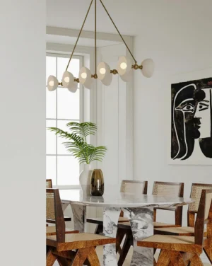 Modern dining room with Vireo linear chandelier over marble table contemporary interior design