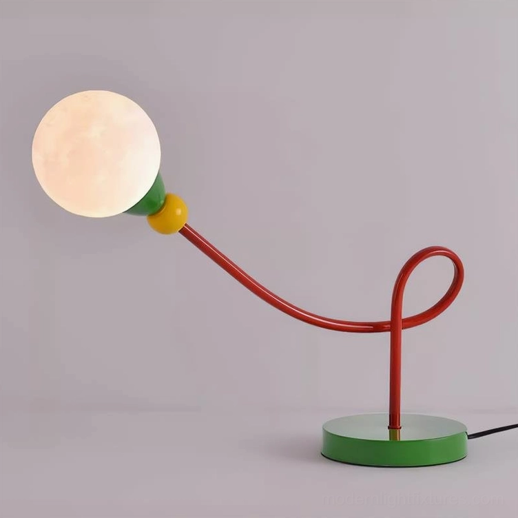 Vitan bold modern table lamp with vibrant green and red color blocking, multiple angle view