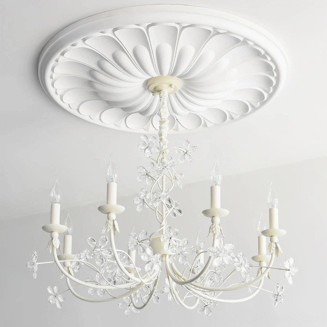 Vivette all-crystal chandelier without colored flower accents mounted on carved ceiling medallion