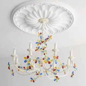 Vivette chandelier mounted on carved ceiling medallion with clear and multicolored glass accents in residential space
