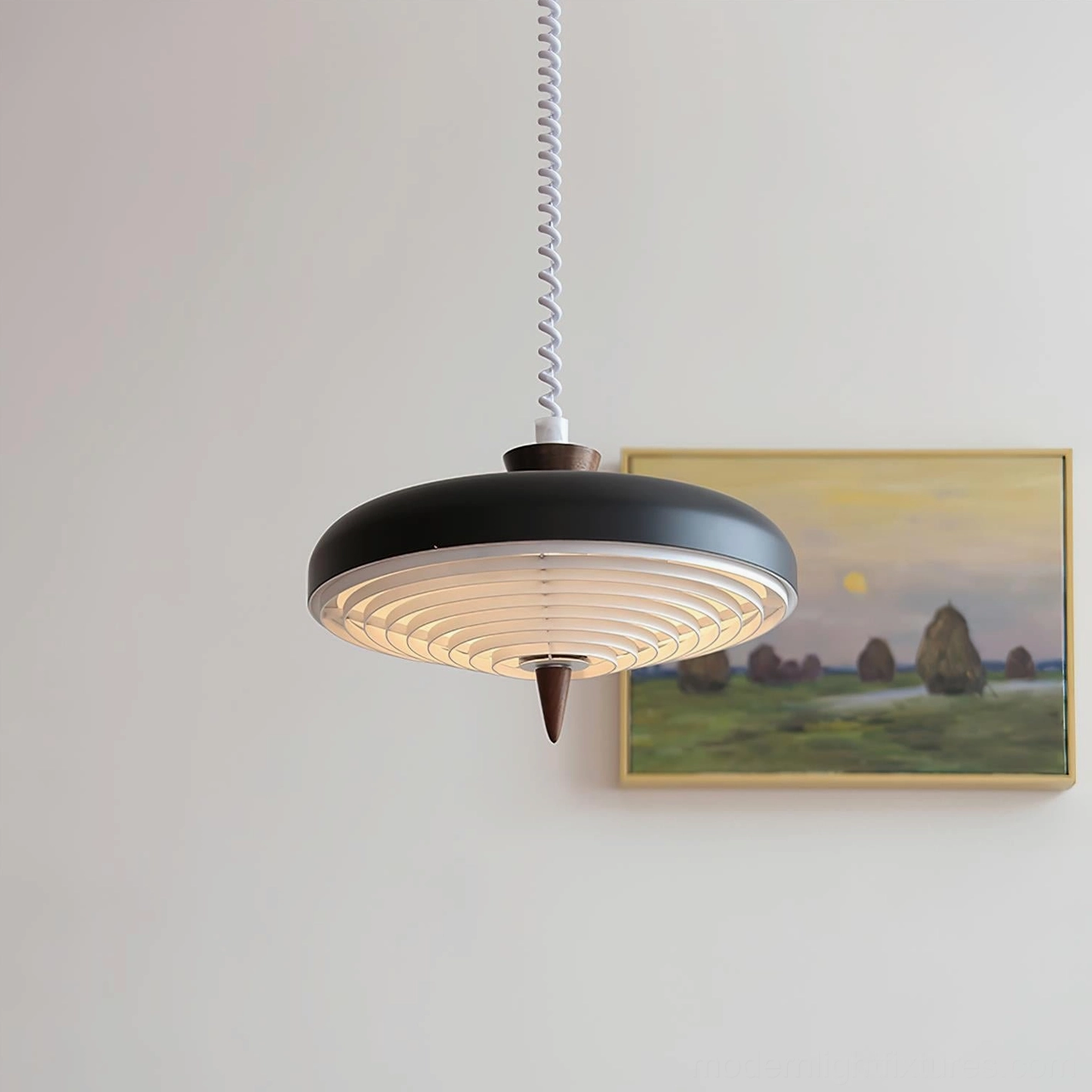 Black metal spiral pendant light with ribbed diffuser, wooden accent finial, and adjustable hanging cord