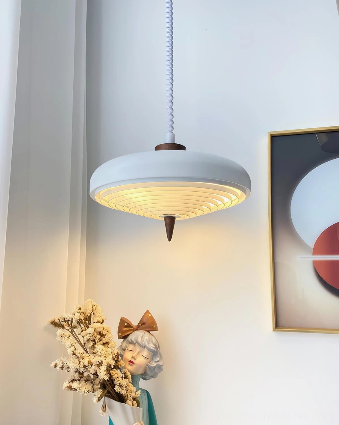 Illuminated white ribbed pendant lamp casting ambient light in modern bedroom or living space design