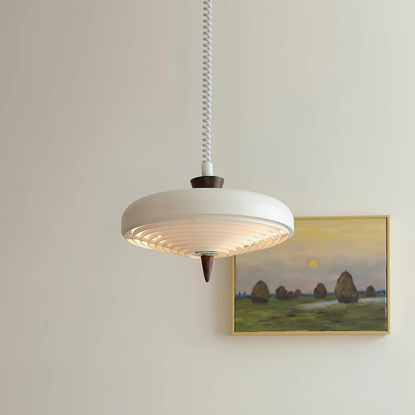 Modern white ribbed pendant lamp in interior setting with gallery wall and landscape painting backdrop