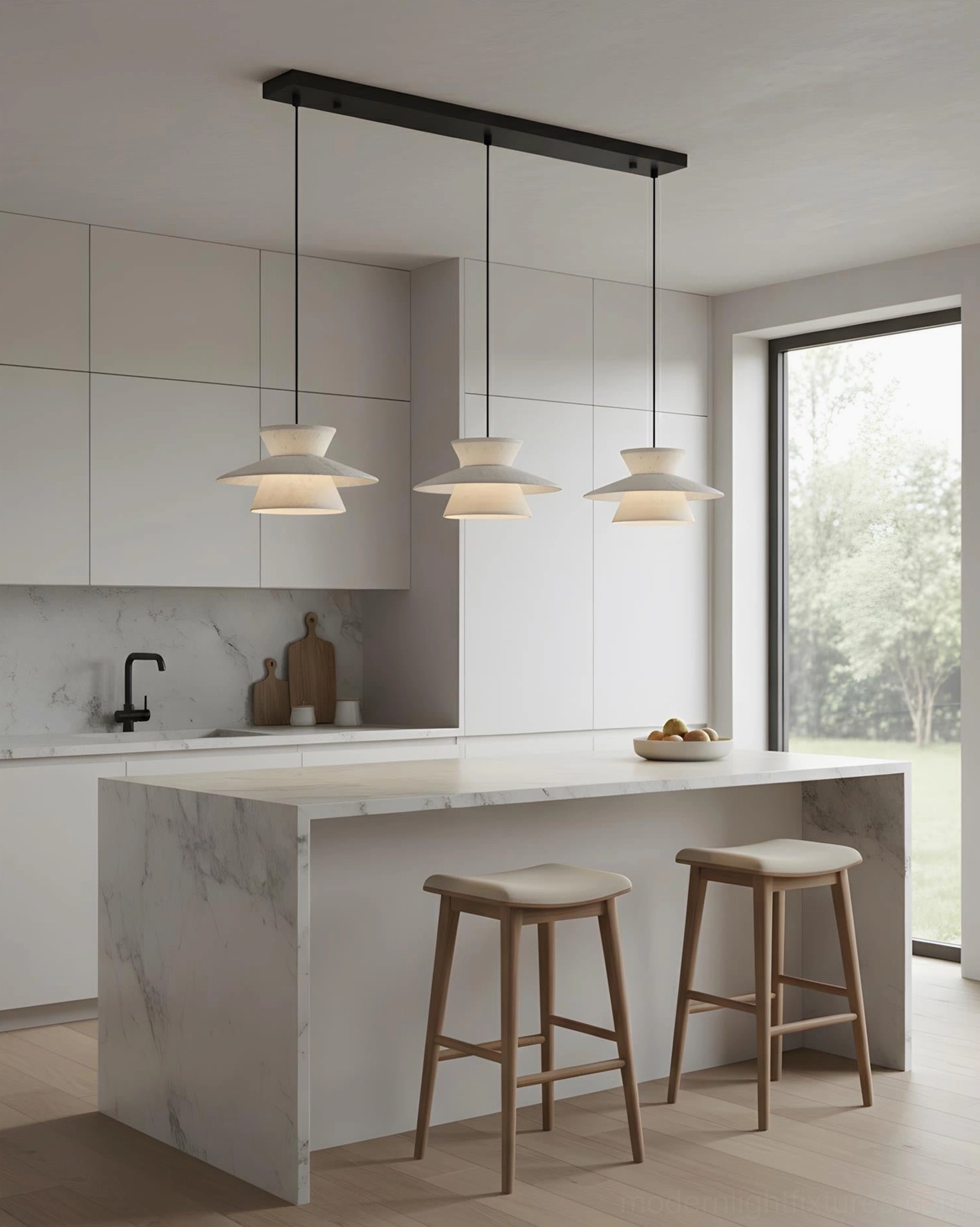 3-head linear Vortin pendant lights above modern kitchen island with japandi minimalist design aesthetic