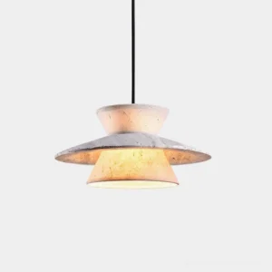 Vortin modern sculptural pendant light with geometric tiered shade, warm ambient glow in studio setting