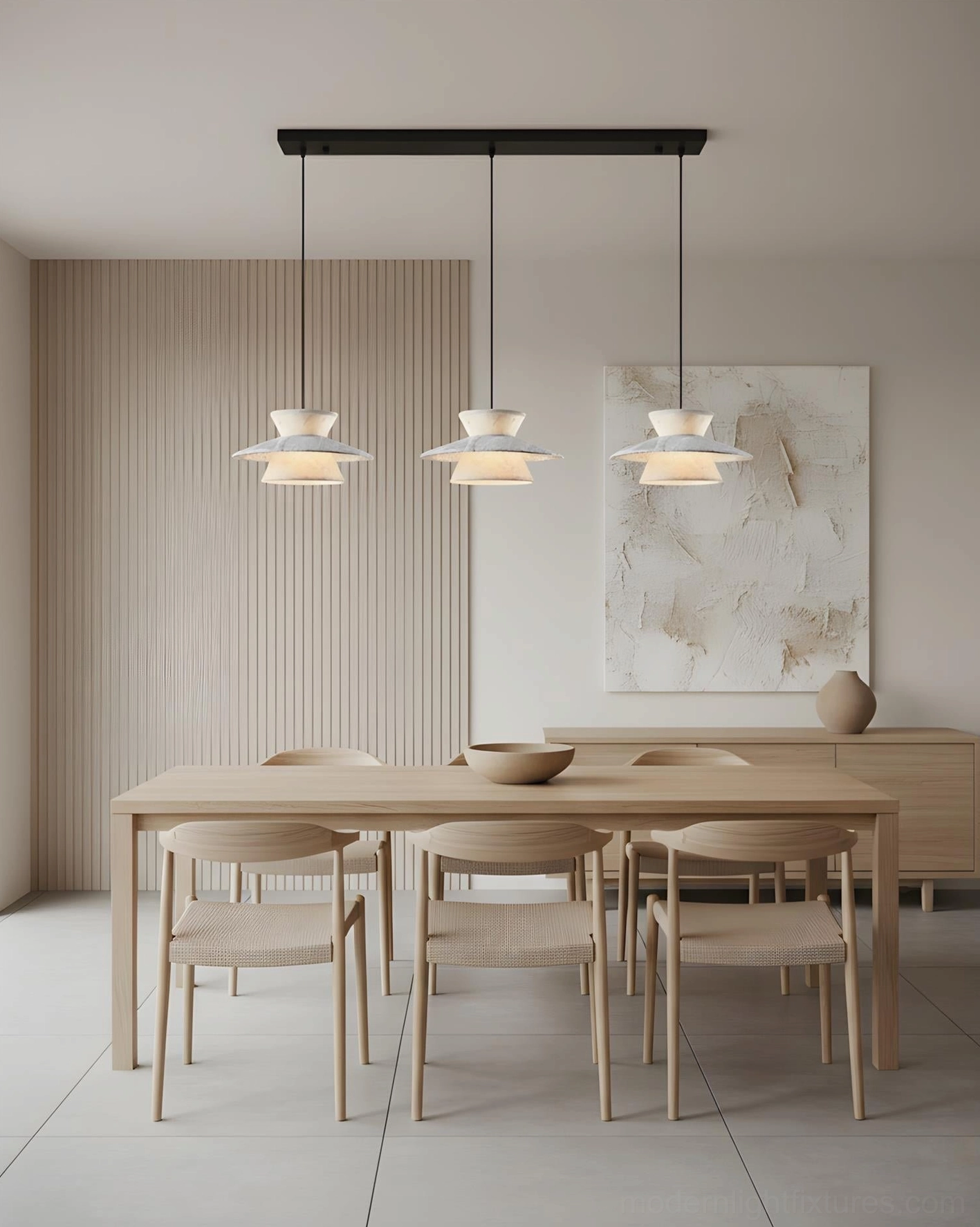 Triple geometric pendant light fixture over wooden dining table in scandinavian style dining room