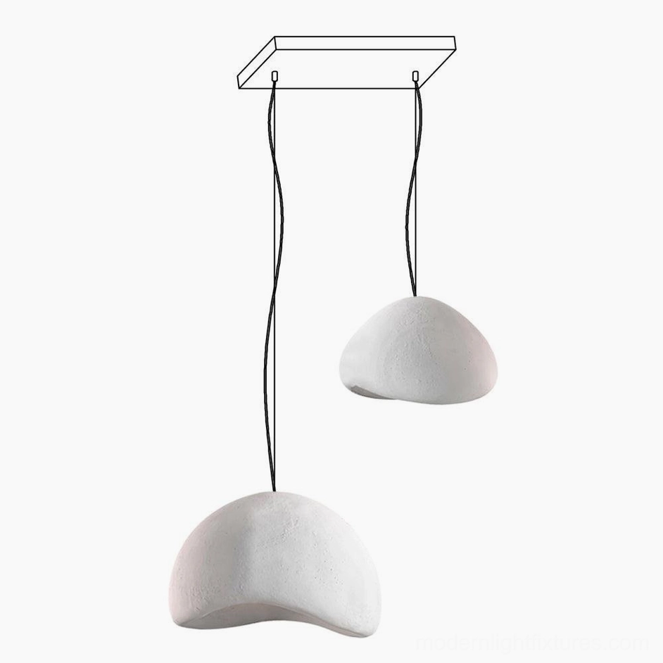 Wabi-sabi multi-pendant lights artistic arrangement dining space