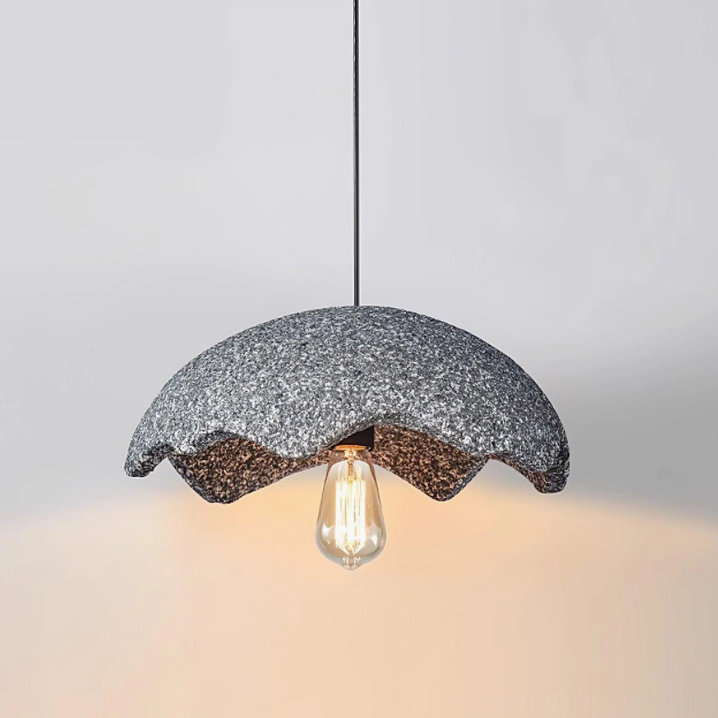 Grey wabi-sabi scalloped pendant light with polystyrene shade in minimalist style