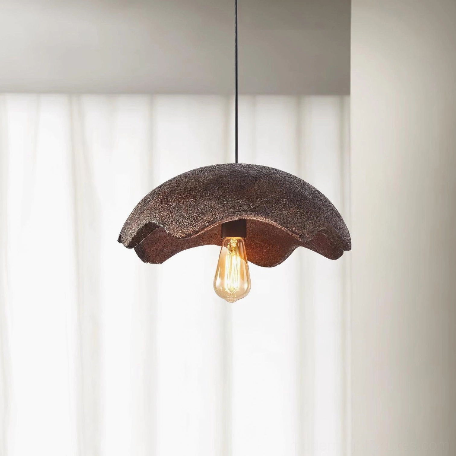 Red wabi-sabi scalloped pendant light close-up showing handcrafted ceramic details and warm bulb