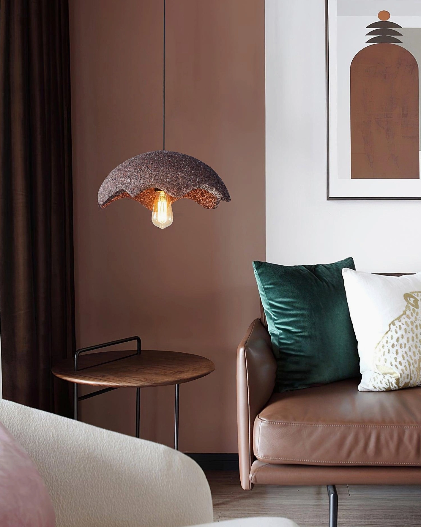 Wabi-sabi scalloped pendant light in red installed above sofa in modern minimalist living room