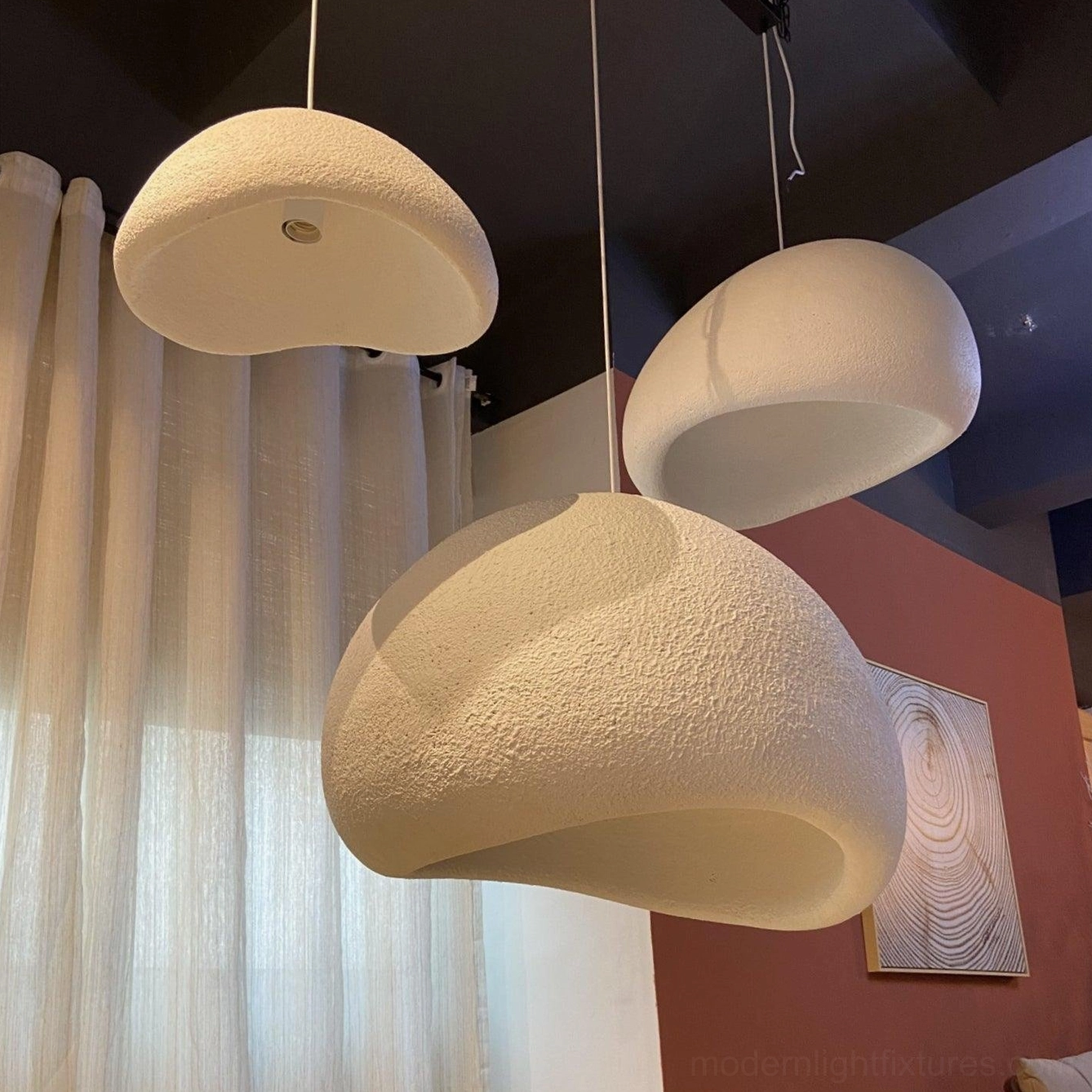 Wabi-sabi pendant light side angle view hanging installation