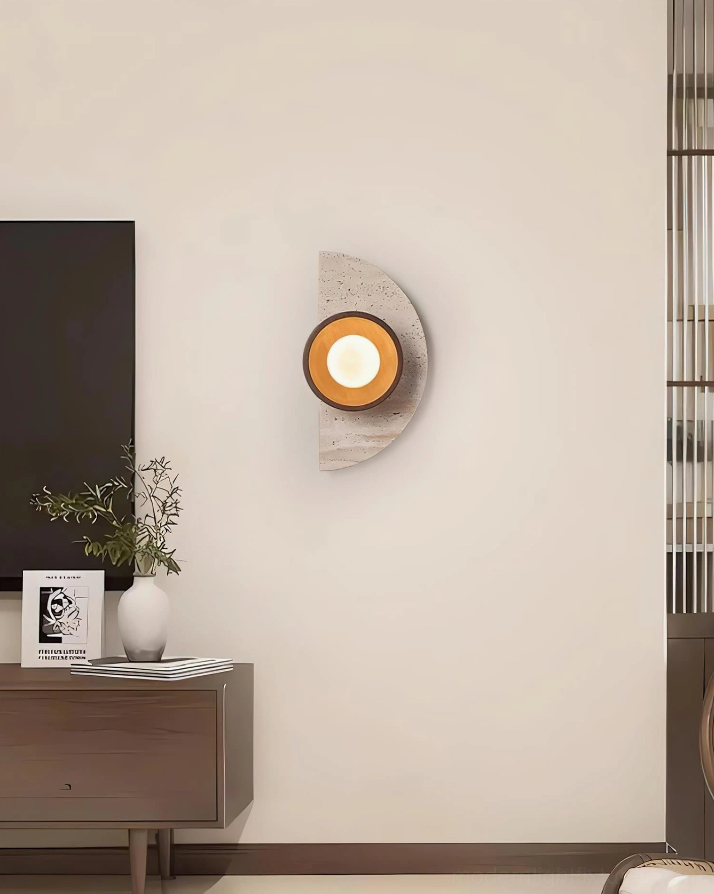 Artisanal travertine and natural wood wall sconce showcasing wabi-sabi design philosophy and organic materials