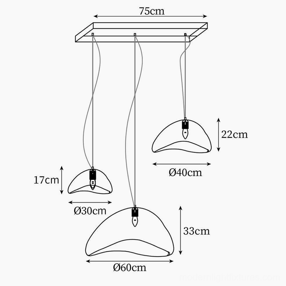 Wabi-sabi zen chandelier lighting fixture creating serene ambient glow in living space