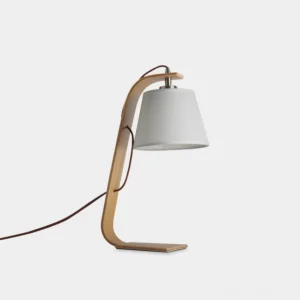 Walden curved wood table lamp with off-white fabric shade and light natural wood frame, front view