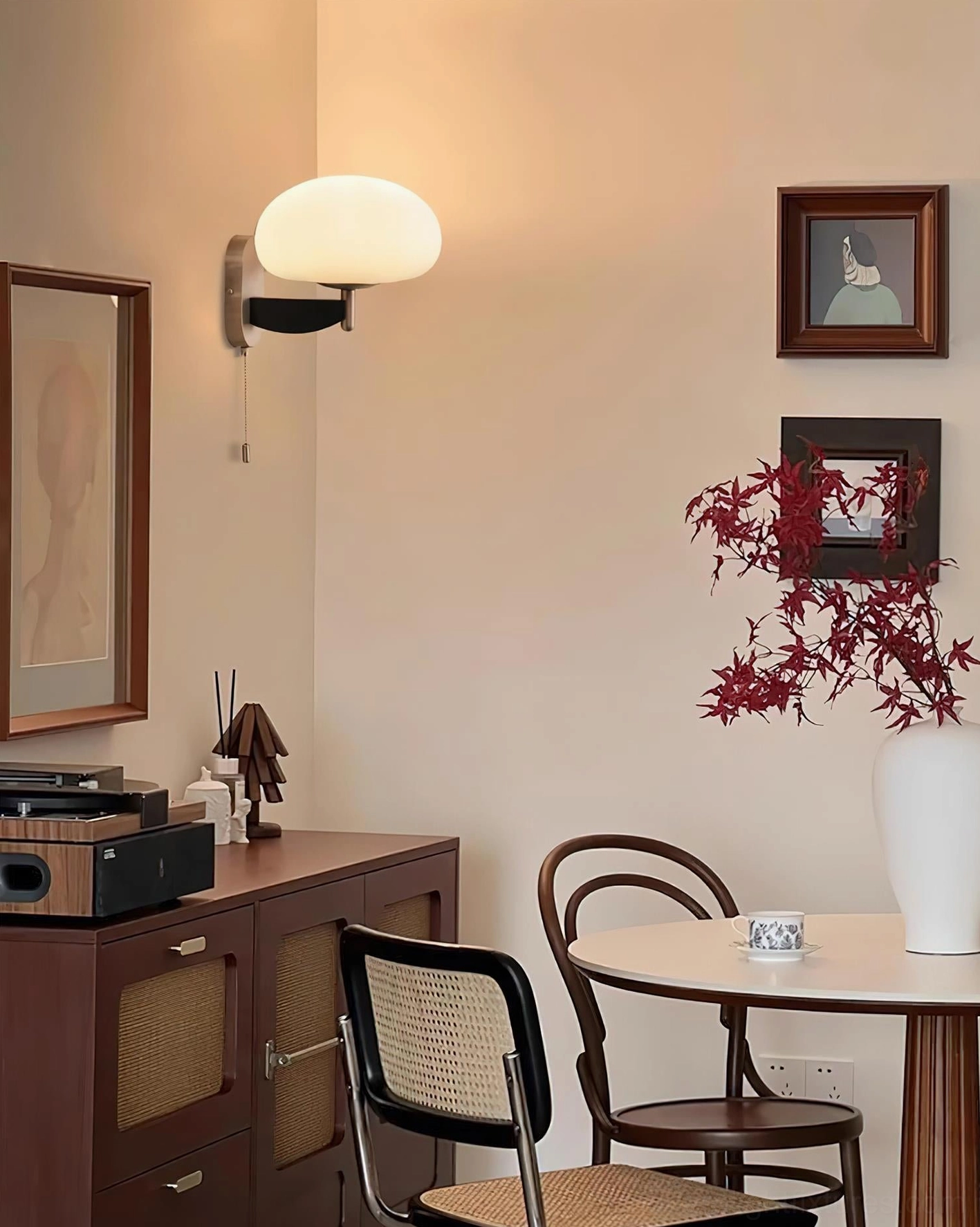 Minimalist retro wall lamp in dining nook scene with sideboard accent lighting